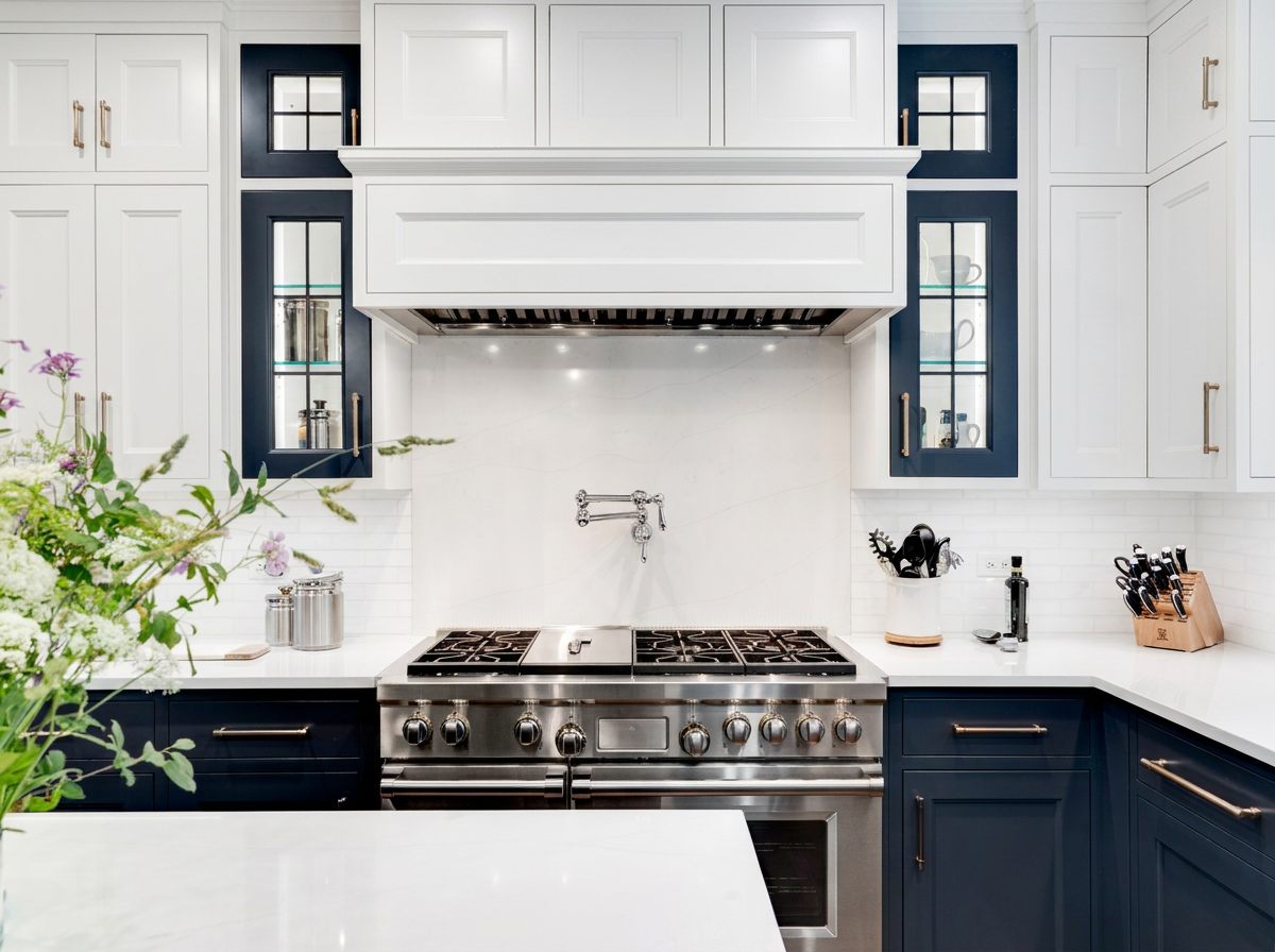 Kitchen remodel with navy and white custom cabinetry