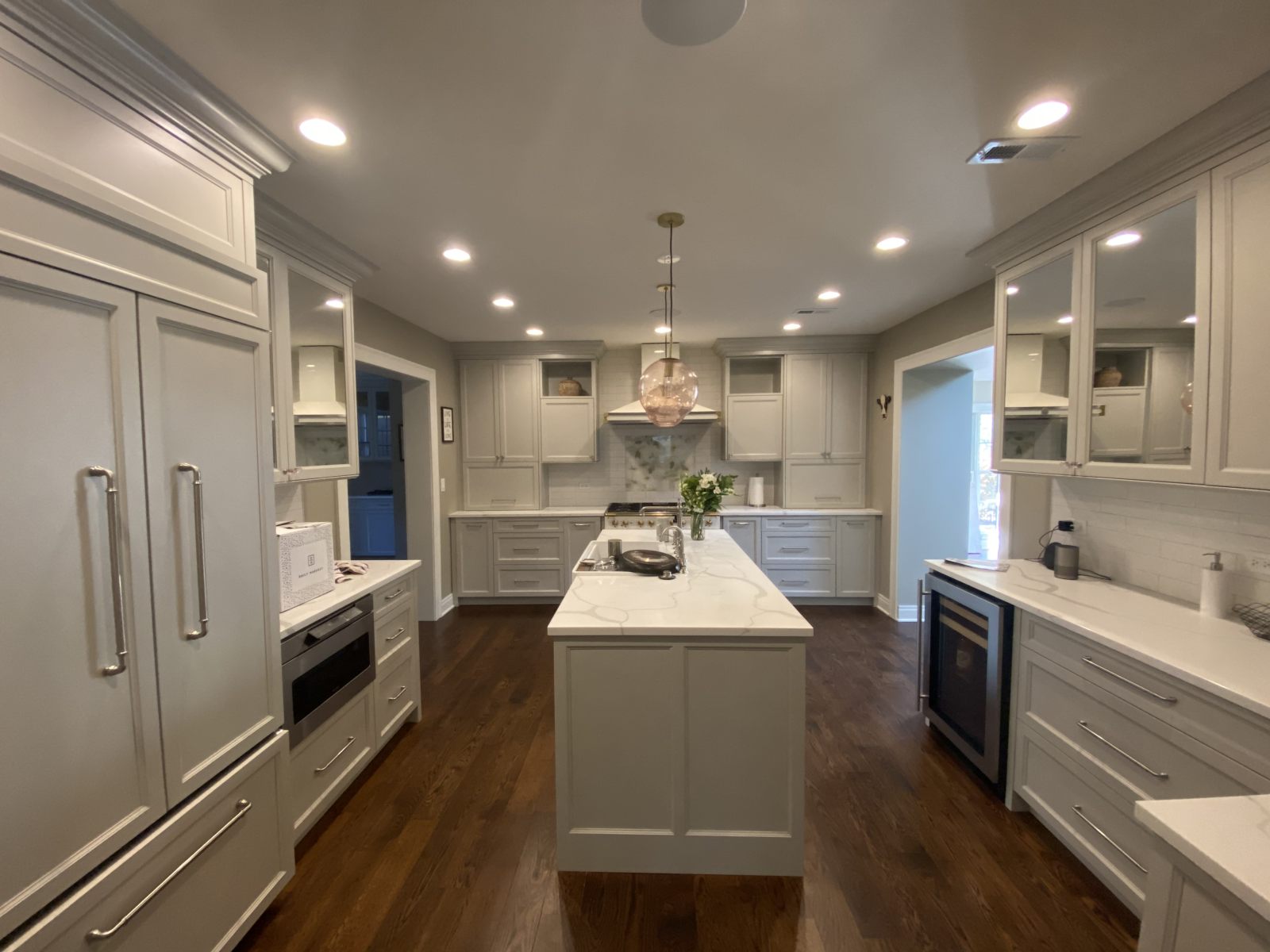 Full kitchen remodel with custom cabinetry, island and hardwood floors